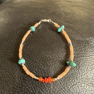 Genuine stone bracelet:  turquoise, carnelian and coral.